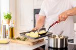 Cuillère ajourée Kitchen Aid en nylon 34cm - Rouge