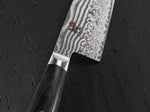 Couteau de chef japonais Miyabi 5000FCD lame 24cm damas 48 couches manche pakkawood