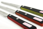 Couteau de table GÜDE Universel 10cm micro-denté manche noir/rouge