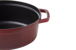 Cocotte Staub ovale en fonte émaillée grenadine